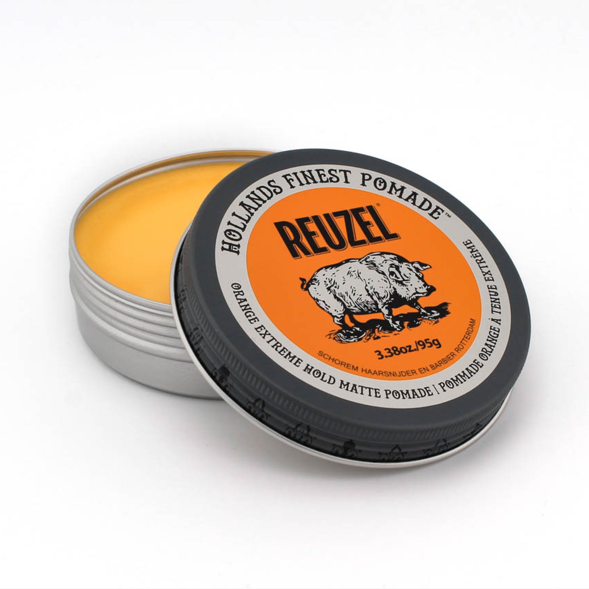 Reuzel Orange Extreme Hold Matte Pomade jar with orange and black label, showcasing the product's packaging and branding.