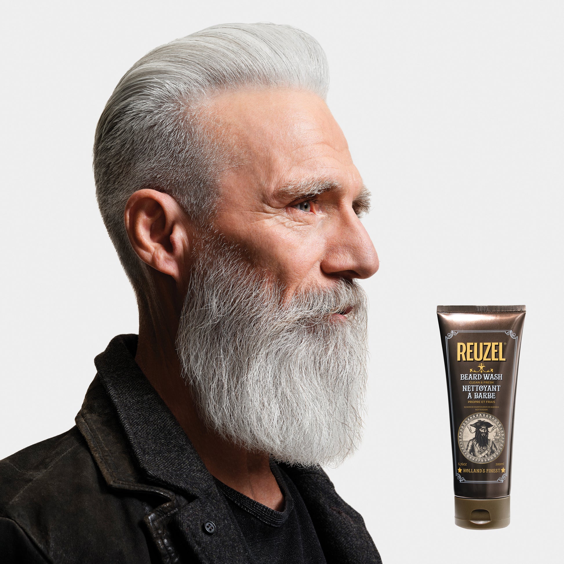 Reuzel Clean & Fresh Beard Wash in a bottle, showcasing the beard grooming product for cleansing and refreshing facial hair.