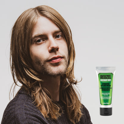 Reuzel Hydrating Styling Cream for hair, showcasing a smooth, creamy formula in a jar with a pump dispenser.