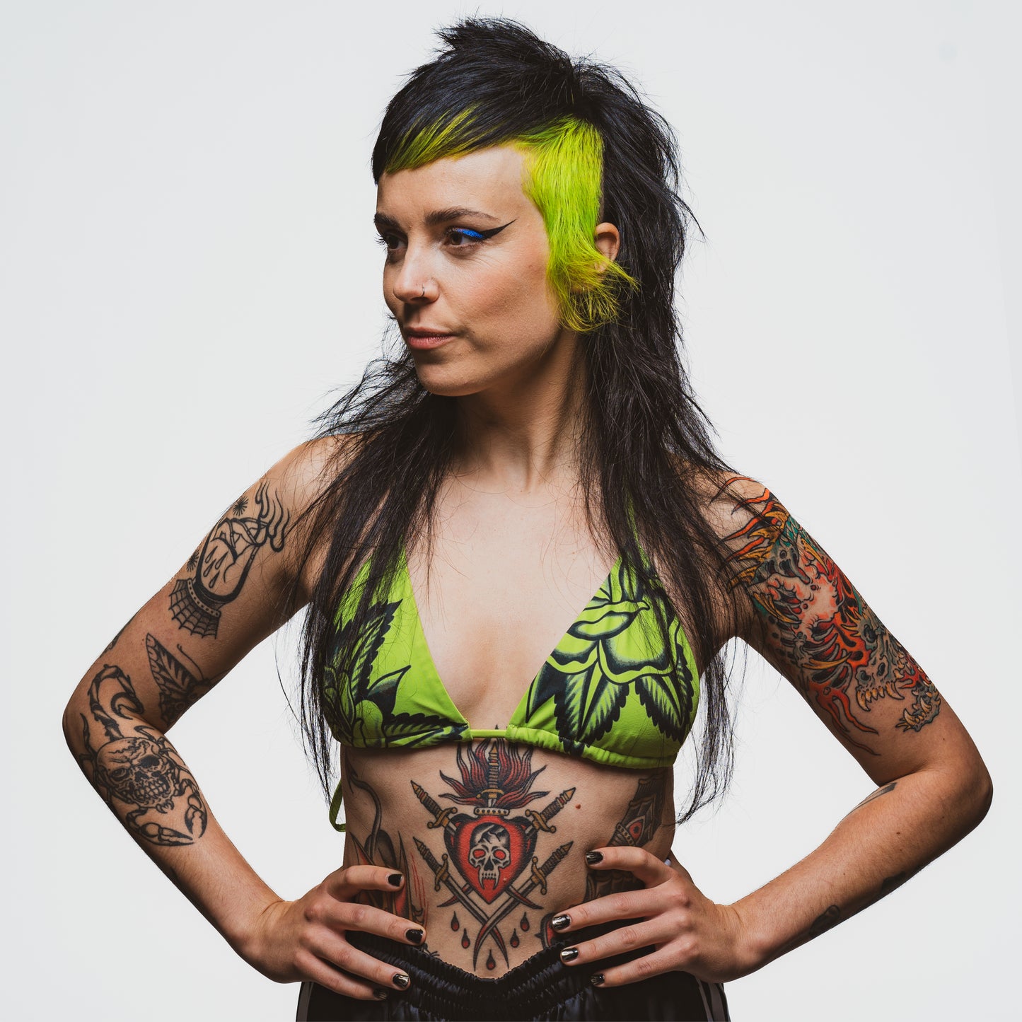 Reuzel TAT Hydrabalm tattoo aftercare product in a tube, designed for moisturizing and healing fresh tattoos.