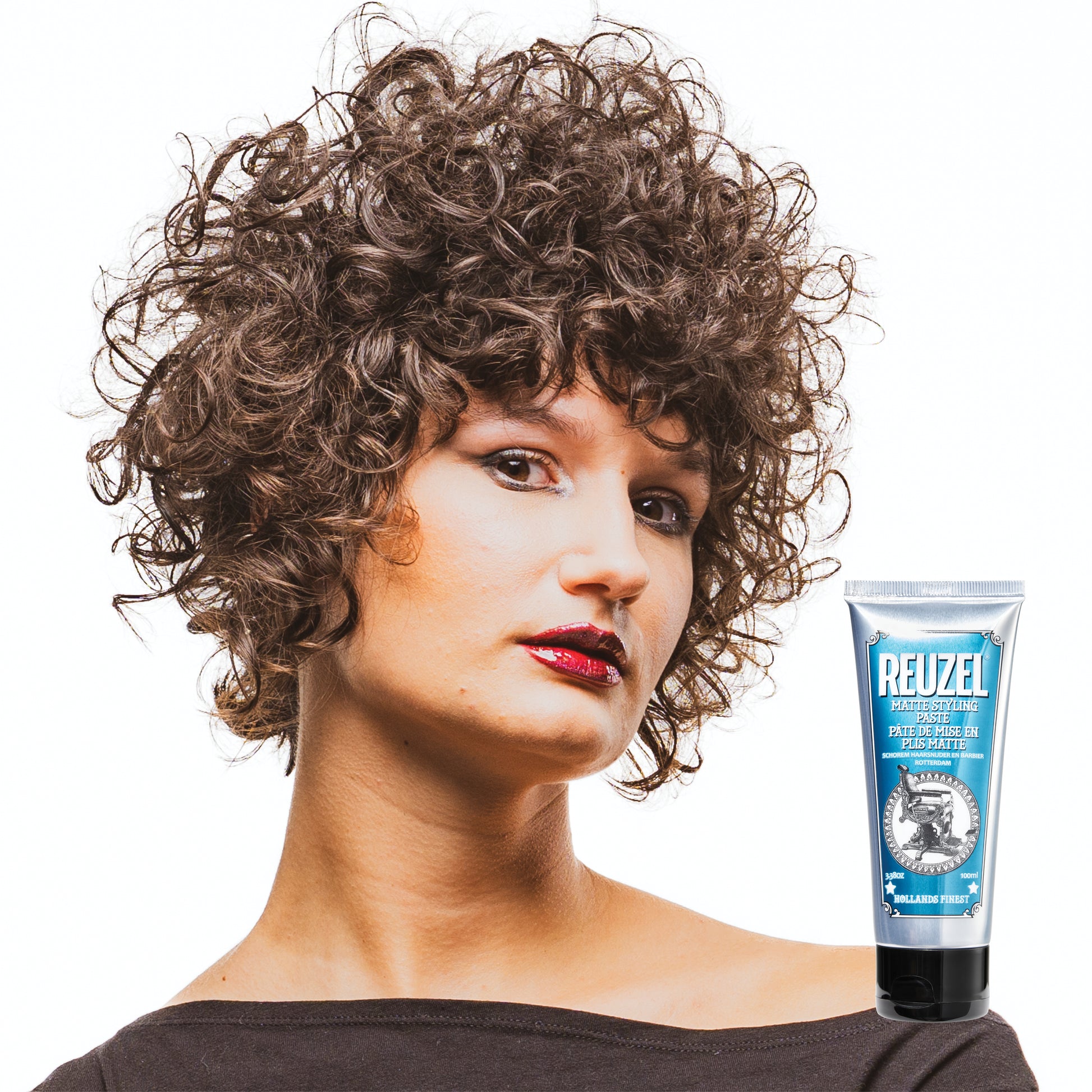 Reuzel Matte Styling Paste in a jar, showing thick, matte hair styling paste with a smooth texture and dark packaging.