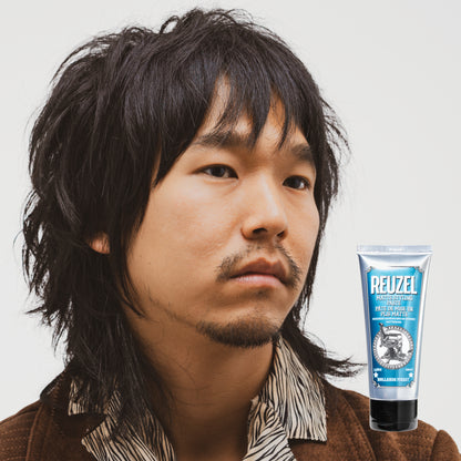 Reuzel Matte Styling Paste in a jar, showing its smooth, matte finish and creamy texture for hair styling.