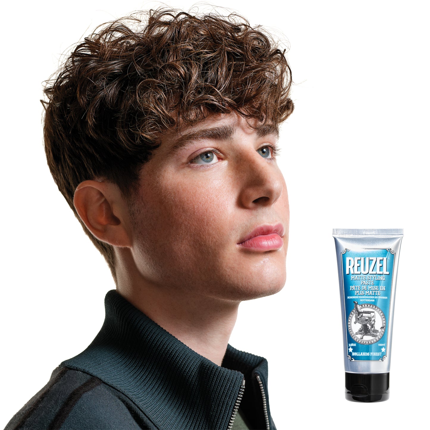 Reuzel Matte Styling Paste in a jar with a textured matte finish, suitable for hair styling and texturizing.