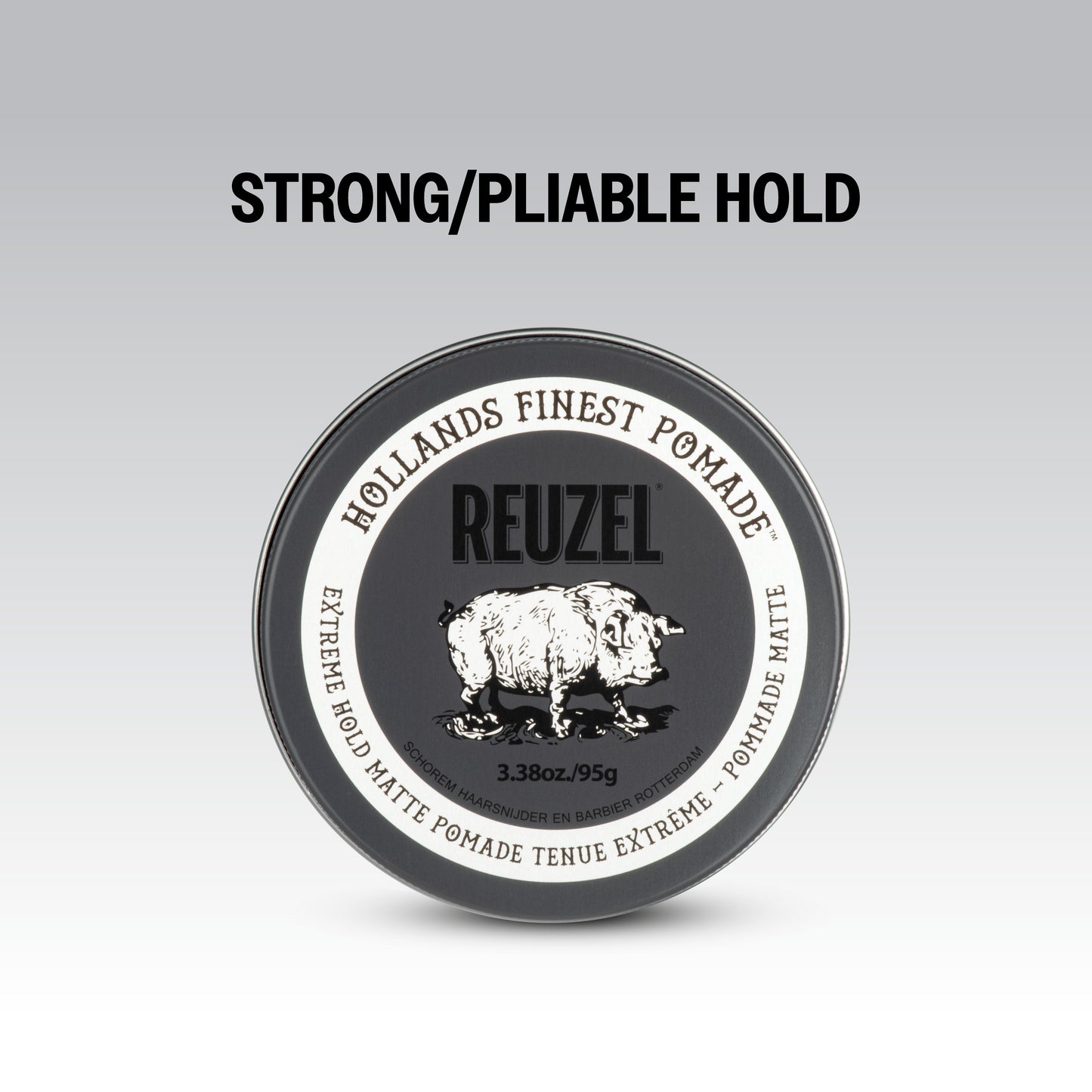 Reuzel Road Trip To Go Extreme Hold Matte Pomade jar with black label and silver lid, showcasing its compact size and sleek design.