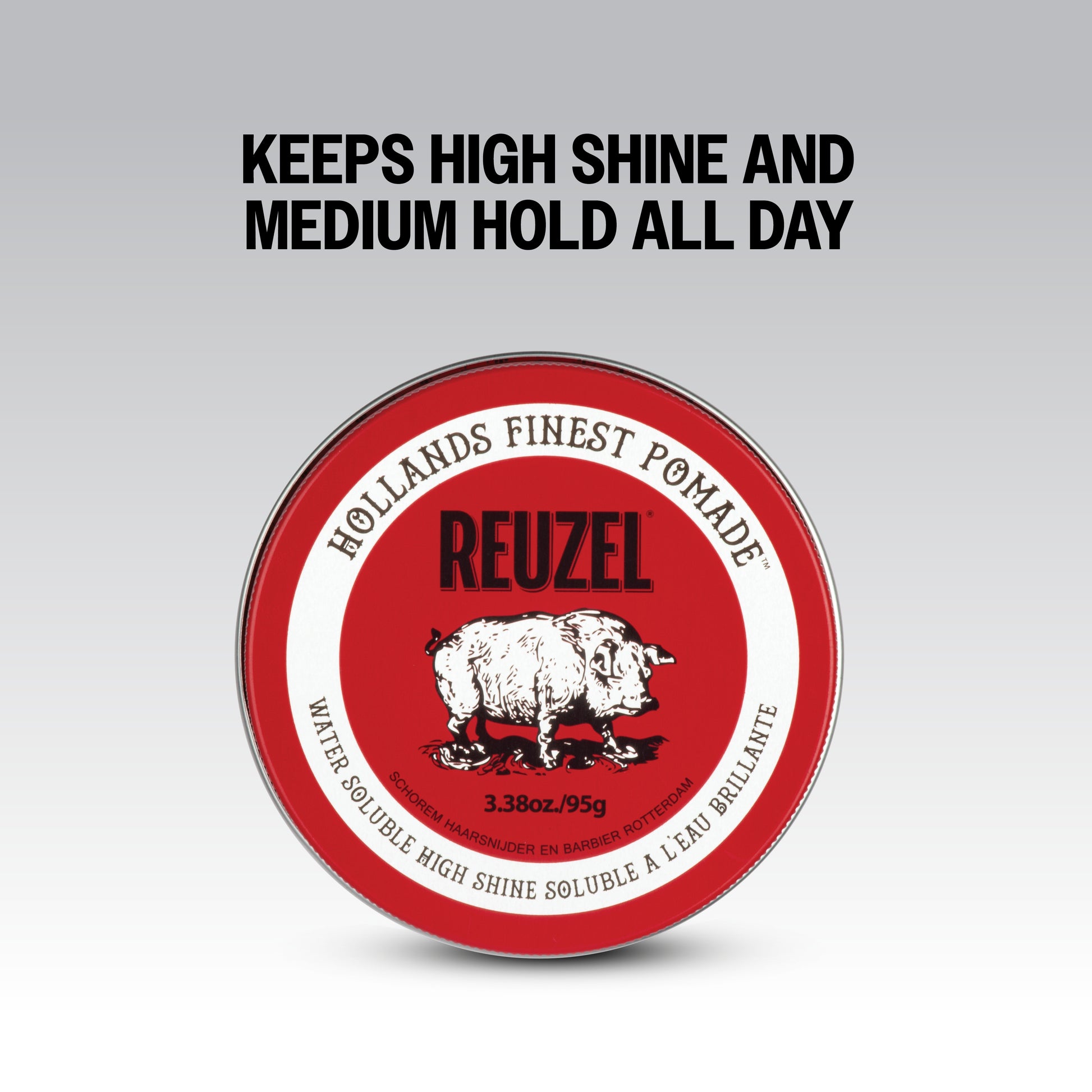 Reuzel Road Trip To Go Red Pomade in a small jar, featuring classic red packaging and a smooth, shiny hairstyle finish.