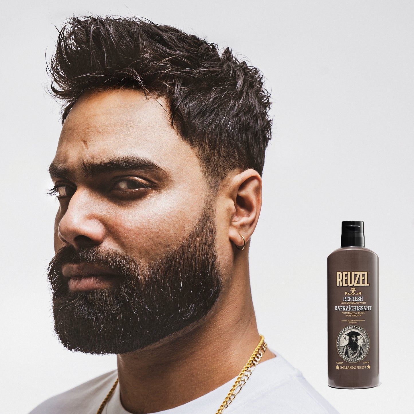 Reuzel Refresh No Rinse Beard Wash bottle with label, designed for cleansing and refreshing men's beards.