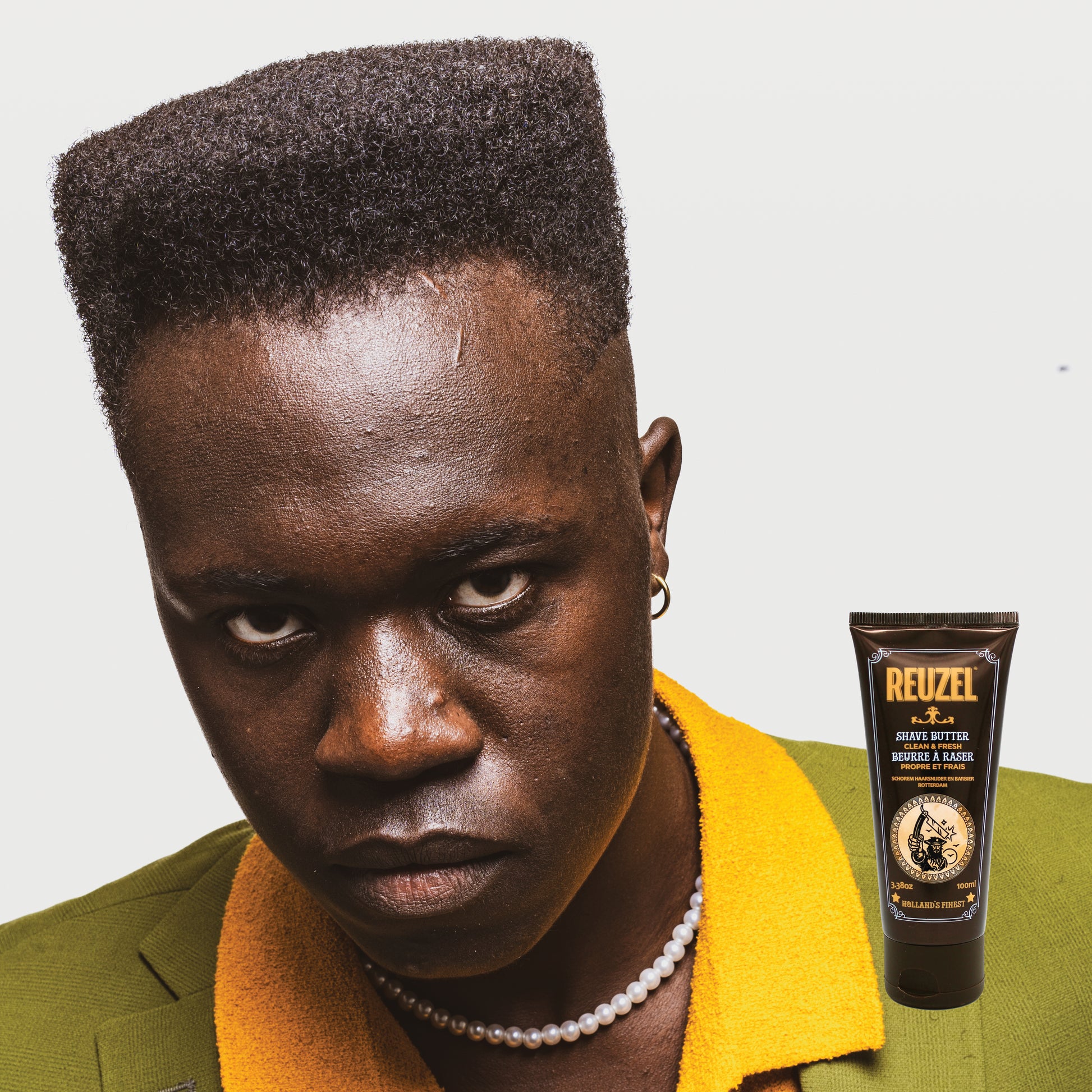 Reuzel Clean & Fresh Shave Butter for beard grooming, showing a jar of the product with a smooth, creamy texture and fresh scent.
