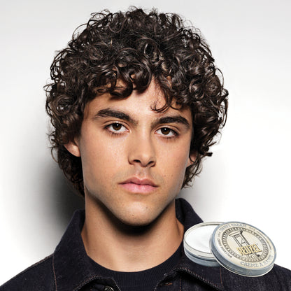 Reuzel beard shave cream in a jar, showing smooth, creamy texture suitable for grooming and facial hair shaving.