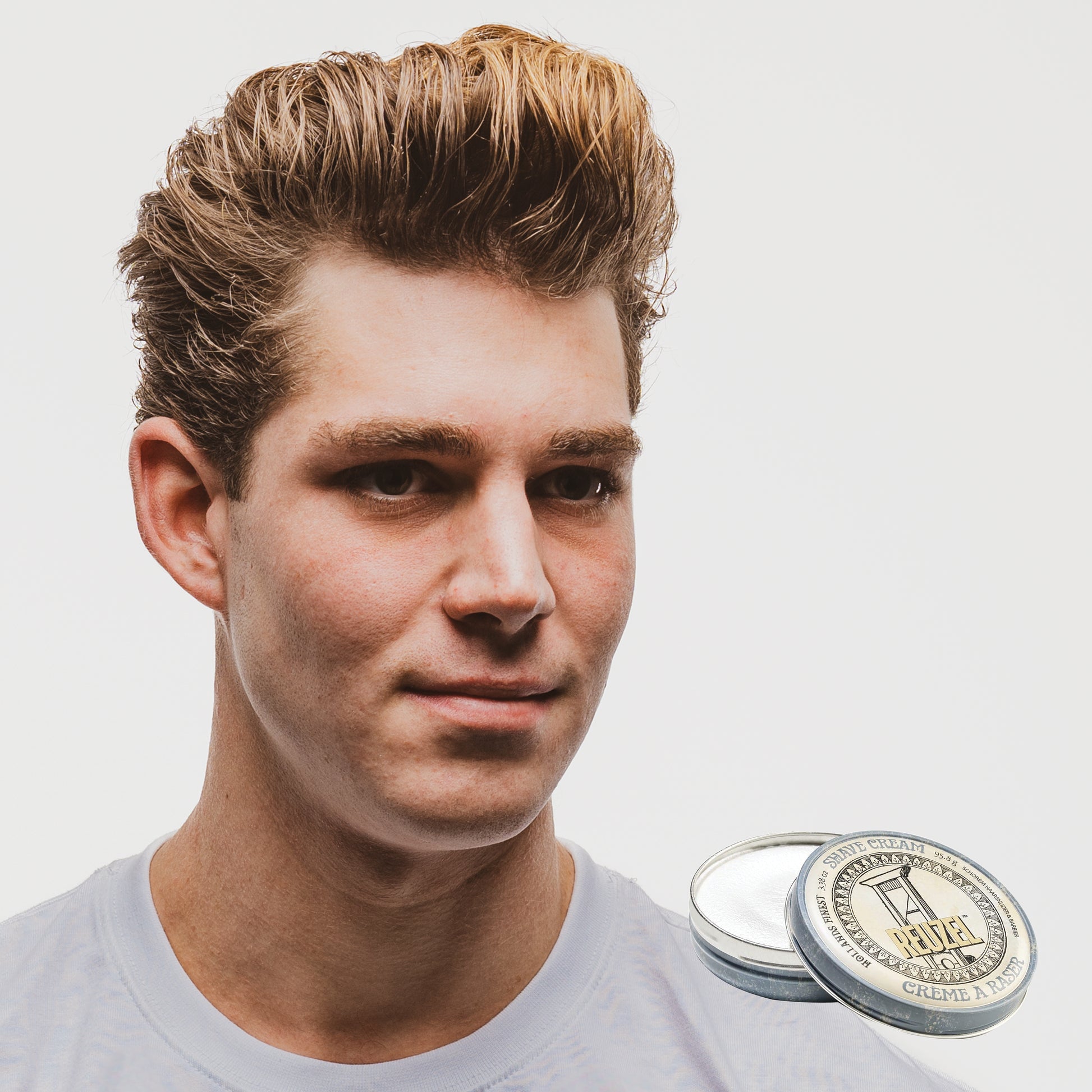Reuzel beard shave cream in a jar, creamy texture, designed for a smooth shave, part of Reuzel beard grooming products.