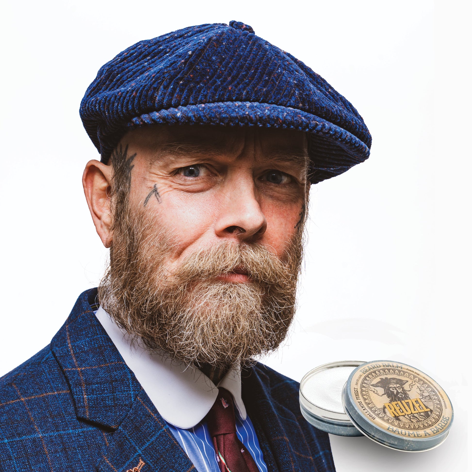 Reuzel Beard Balm Wood & Spice in a jar, with a natural wood and spice scent, designed for nourishing and styling men's beards.