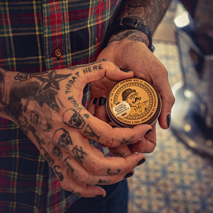 Reuzel Mustache Wax Bourbon Sidecar for styling mustaches, with a smooth texture and bourbon scent, ideal for beard grooming.