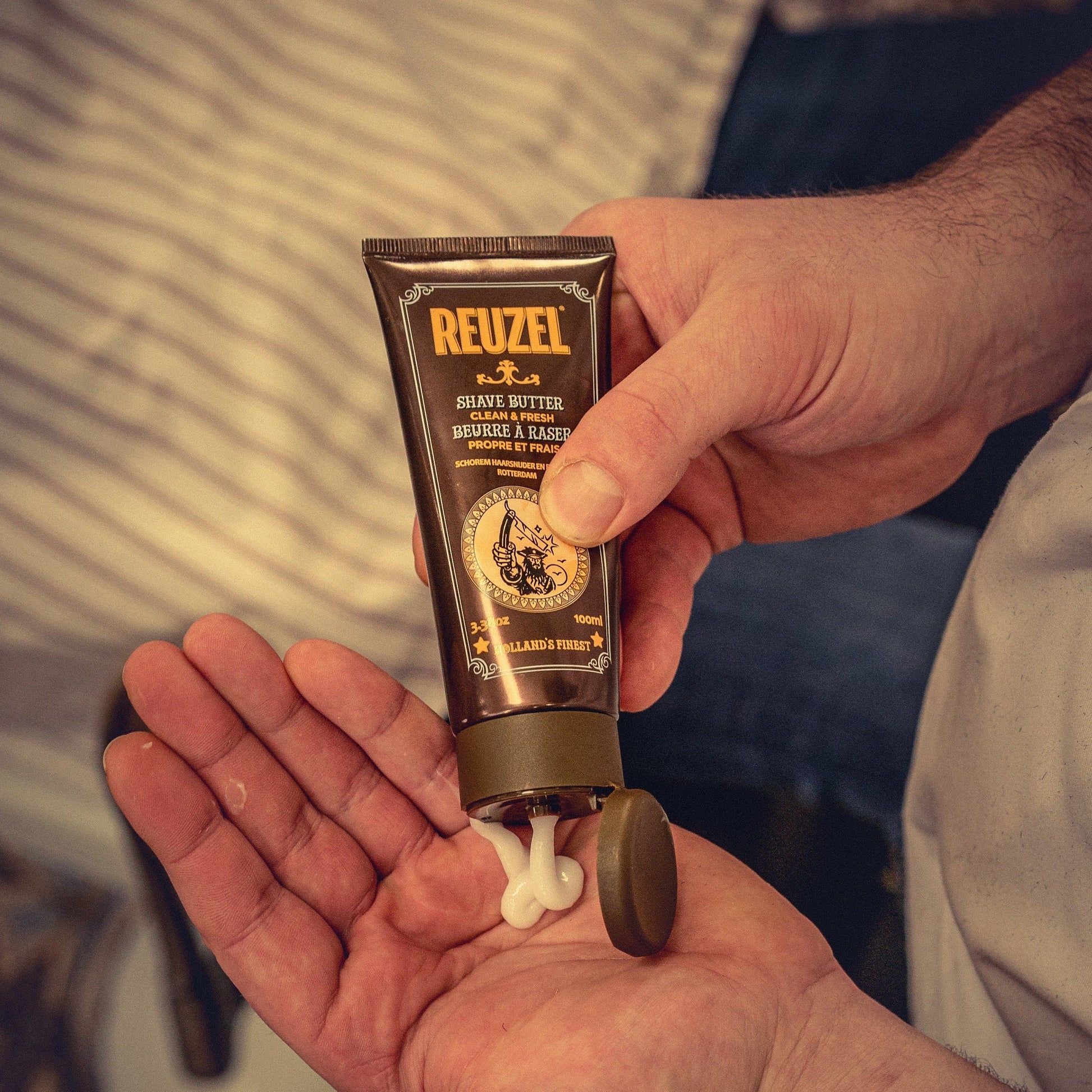 Reuzel Clean & Fresh Shave Butter for beard grooming, smooth texture and fresh scent in a grooming product jar.
