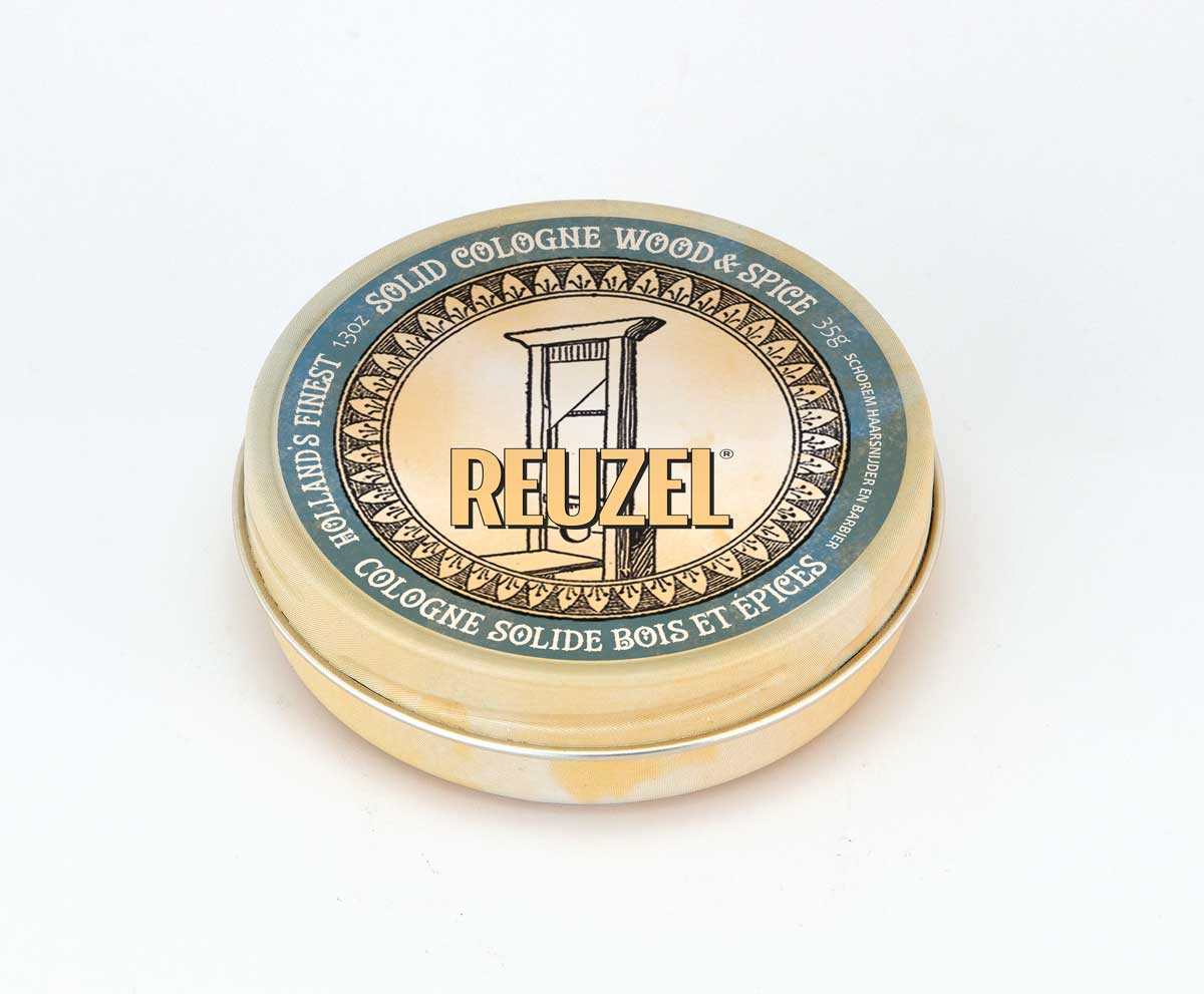Reuzel Wood & Spice Solid Cologne Balm for beards, featuring a natural wood and spice scent in a compact balm container.