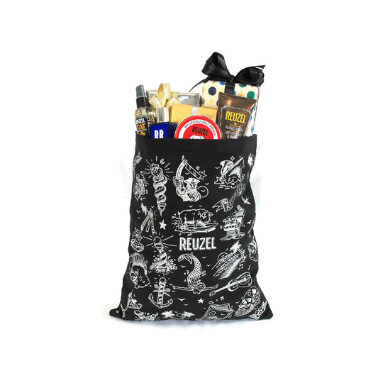 Reuzel Limited Tote Bag from REUZEL UK merch collection, featuring a stylish design with the Reuzel logo and holiday-themed artwork.